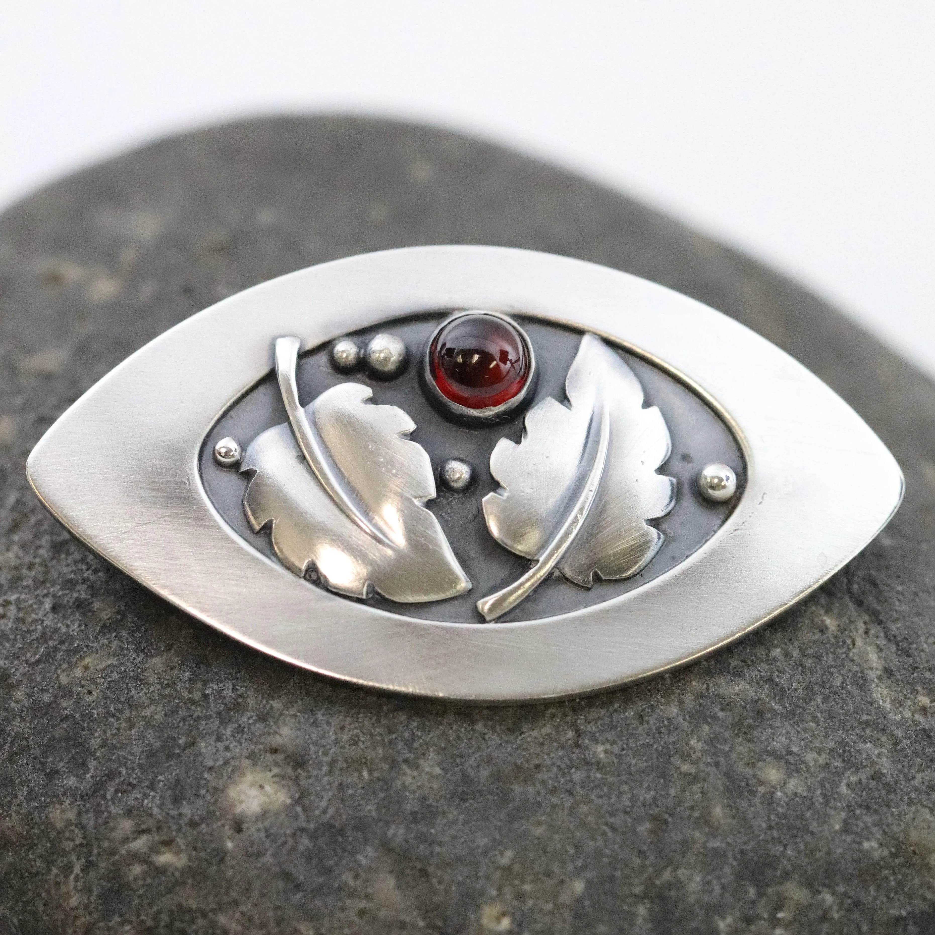 Vintage Lawrence Foss Silver Jewelry | Foliate and Garnet Brooch